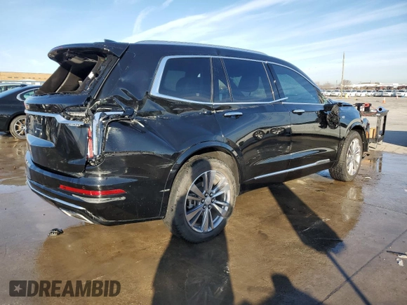 2023 Cadillac XT6 FWD Premium Luxury z VIN 1GYKPCRS6PZ127331, wystawiony jako Copart lot #88802755 z przebiegiem 47 796 mil mil oraz Szkoda całkowita • Salvage title. Historia ofert i sprzedaży dostępna na DreamBid. Obrazek 3.