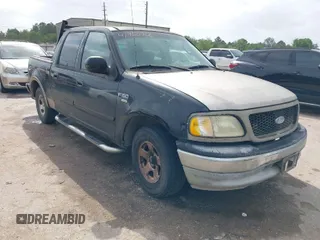 2003 Ford F-150 XLT with VIN 1FTRW07623KB30354, listed as a IAAI auction lot 41960766 with 366,800 mi miles. Bid and sale history available at carsss.com. Image 1.