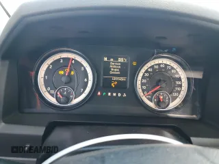 2014 Ram 1500 Lone Star z VIN 1C6RR6LG6ES398021, wystawiony jako Copart lot #72802014 z przebiegiem 120 048 mil mil oraz Szkoda całkowita • Salvage title. Historia ofert i sprzedaży dostępna na DreamBid. Obrazek 9.