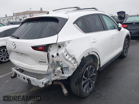 2022 Mazda CX-5 S Premium Plus with VIN JM3KFBEM6N0615083, listed as a IAAI auction lot 41907406 with 49,617 mi miles and . Bid and sale history available at carsss.com. Image 4.