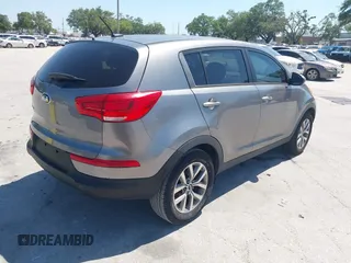 2014 Kia Sportage LX with VIN KNDPB3AC7E7595527, listed as a IAAI auction lot 42062615 with 64,777 mi miles. Bid and sale history available at carsss.com. Image 4.