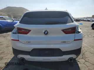 2018 BMW X2 sDrive28i with VIN WBXYJ3C34JEJ84163, listed as a Copart auction lot 54043904 with 46,509 mi miles and Salvage title. Bid and sale history available at DreamBid. Image 6.