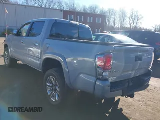 2018 Toyota Tacoma SR with VIN 3TMGZ5AN7JM165084, listed as a IAAI auction lot 41620305 with 21,010 mi miles. Bid and sale history available at carsss.com. Image 3.