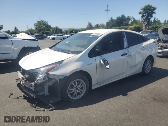 2018 Toyota Prius Two z VIN JTDKBRFU4J3082395, wystawiony jako Copart lot #56761505 z przebiegiem Nie podano mil oraz Szkoda całkowita • Salvage title. Historia ofert i sprzedaży dostępna na DreamBid. Obrazek 1.
