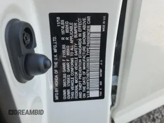 2019 Honda Civic EX-L z VIN SHHFK7H87KU206393, wystawiony jako Copart lot #52809495 z przebiegiem 86 448 mil mil oraz Nie do naprawy • Non repairable. Historia ofert i sprzedaży dostępna na DreamBid. Obrazek 14.