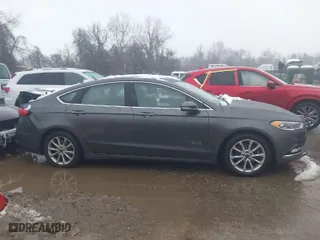 2017 Ford Fusion Energi SE with VIN 3FA6P0PU6HR203037, listed as a IAAI auction lot 41567334 with 96,852 mi miles. Bid and sale history available at carsss.com. Image 13.