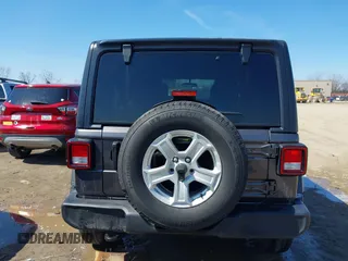 2022 Jeep Wrangler Unlimited Willys with VIN 1C4HJXDN1NW144112, listed as a IAAI auction lot 41867571 with 63,876 mi miles and . Bid and sale history available at DreamBid. Image 17.