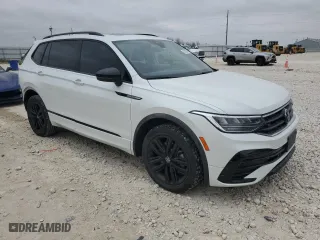 2022 Volkswagen Tiguan SE R-Line Black with VIN 3VVCB7AX0NM169257, listed as a Copart auction lot 43129745 with 59,517 mi miles and Salvage Title. Bid and sale history available at carsss.com. Image 4.