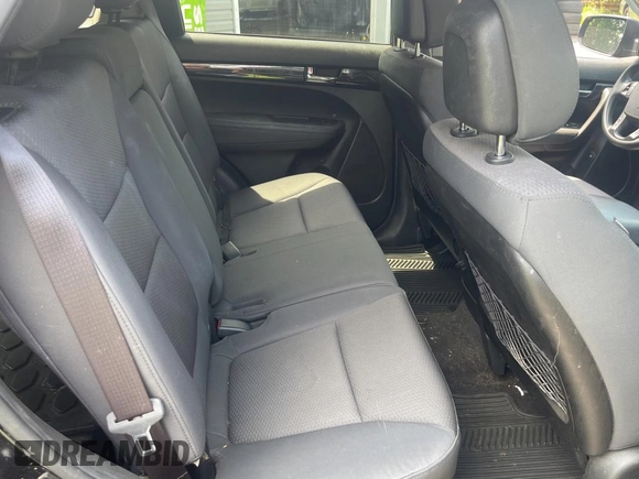 2013 Kia Sorento LX with VIN 5XYKTCA65DG324775, listed as a Copart auction lot 63433705 with 128,031 mi miles and Clean title. Bid and sale history available at DreamBid. Image 6.