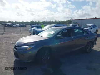 2015 Toyota Camry XLE with VIN 4T1BF1FK6FU046922, listed as a IAAI auction lot 41967284 with 82,487 mi miles and . Bid and sale history available at DreamBid. Image 2.