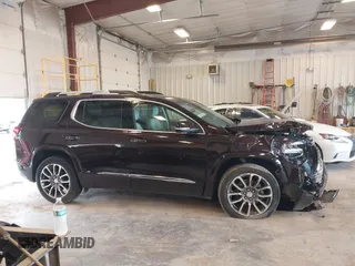 2021 GMC Acadia Denali with VIN 1GKKNXLS2MZ140119, listed as a IAAI auction lot 42553557 with 50,197 mi miles and . Bid and sale history available at DreamBid. Image 13.