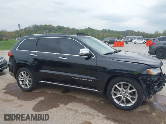 2015 Jeep Grand Cherokee Summit z VIN 1C4RJFJT0FC674494, wystawiony jako IAAI lot #42056835 z przebiegiem 143 969 mil mil oraz . Historia ofert i sprzedaży dostępna na DreamBid. Obrazek 14.