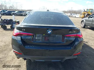 2024 BMW i4 xDrive40 with VIN WBY83FB04RFT19615, listed as a IAAI auction lot 41679918 with 3,883 mi miles. Bid and sale history available at carsss.com. Image 16.