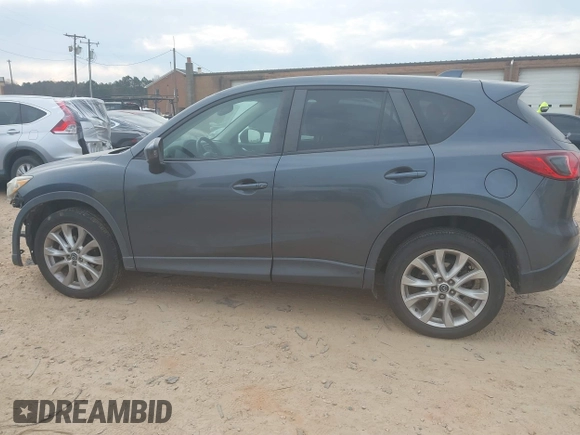 2013 Mazda CX-5 Grand Touring with VIN JM3KE4DE2D0164225, listed as a IAAI auction lot 41663412 with 162,738 mi miles. Bid and sale history available at carsss.com. Image 14.
