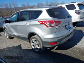 2014 Ford Escape SE with VIN 1FMCU9G95EUE49423, listed as a IAAI auction lot 41792045 with 56,733 mi miles and . Bid and sale history available at carsss.com. Image 3.