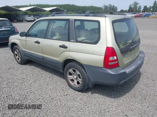 2003 Subaru Forester X with VIN JF1SG63673H741605, listed as a IAAI auction lot 42565708 with 194,796 mi miles and . Bid and sale history available at DreamBid. Image 3.
