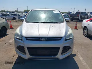 2013 Ford Escape SEL z VIN 1FMCU9H95DUC87631, wystawiony jako IAAI lot #42564756 z przebiegiem 144 467 mil mil oraz . Historia ofert i sprzedaży dostępna na DreamBid. Obrazek 6.