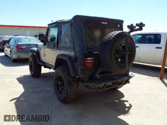2005 Jeep Wrangler Sport with VIN 1J4FA49S45P345673, listed as a IAAI auction lot 41830128 with 139,432 mi miles. Bid and sale history available at carsss.com. Image 3.