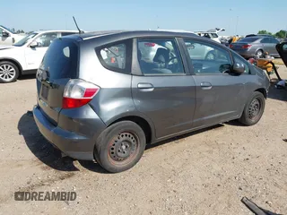 2013 Honda Fit with VIN JHMGE8H37DC048529, listed as a IAAI auction lot 42011202 with 255,113 mi miles. Bid and sale history available at carsss.com. Image 4.