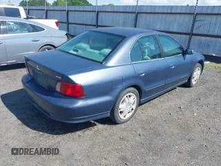 2002 Mitsubishi Galant ES z VIN 4A3AA46H42E070139, wystawiony jako IAAI lot #42162751 z przebiegiem 260 885 mil mil oraz . Historia ofert i sprzedaży dostępna na DreamBid. Obrazek 4.