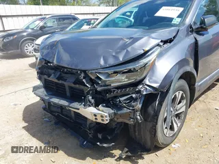 2018 Honda CR-V LX with VIN 5J6RW5H31JL000794, listed as a IAAI auction lot 41864939 with 78,694 mi miles and . Bid and sale history available at DreamBid. Image 6.