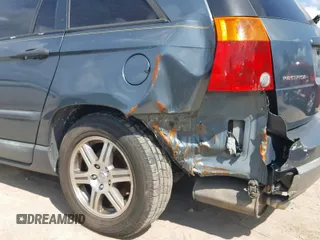 2007 Chrysler Pacifica z VIN 2A8GF48X67R158762, wystawiony jako Copart lot #70044154 z przebiegiem 209 816 mil mil oraz Nie do naprawy • Non repairable. Historia ofert i sprzedaży dostępna na DreamBid. Obrazek 9.