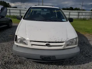 2000 Toyota Sienna CE with VIN 4T3GF19C0YU294779, listed as a Copart auction lot 74715024 with 164,664 mi miles and Salvage Title. Bid and sale history available at carsss.com. Image 5.