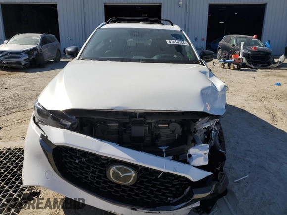 2024 Mazda CX-5 2.5 Carbon Turbo with VIN JM3KFBAY5R0473887, listed as a Copart auction lot 49859265 with 9,220 mi miles and Salvage Title. Bid and sale history available at carsss.com. Image 5.