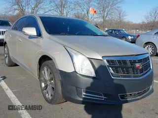 2013 Cadillac XTS Luxury with VIN 2G61R5S31D9185009, listed as a IAAI auction lot 41243001 with 161,219 mi miles. Bid and sale history available at carsss.com. Image 1.