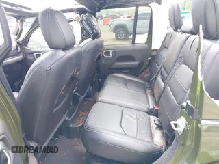 2023 Jeep Wrangler Sahara with VIN 1C4JJXP60PW556336, listed as a IAAI auction lot 39553199 with 10,437 mi miles and . Bid and sale history available at DreamBid. Image 8.
