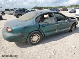 1997 Ford Taurus LX with VIN 1FALP53S1VG316689, listed as a Copart auction lot 67168694 with 211,414 mi miles and Salvage Title. Bid and sale history available at carsss.com. Image 3.