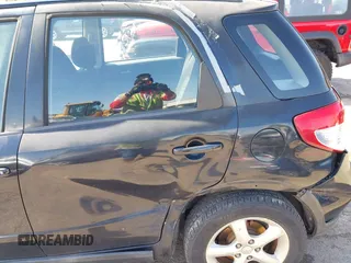 2008 Suzuki SX4 Regional Edition Touring with VIN JS2YA413985101364, listed as a IAAI auction lot 41966448 with 92,764 mi miles. Bid and sale history available at carsss.com. Image 6.