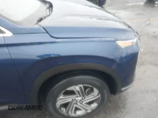 2022 Hyundai Santa Fe SE z VIN 5NMS14AJ8NH406846, wystawiony jako IAAI lot #41588202 z przebiegiem 34 006 mil mil oraz . Historia ofert i sprzedaży dostępna na DreamBid. Obrazek 19.