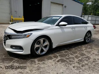 2019 Honda Accord Touring z VIN 1HGCV2F94KA033470, wystawiony jako Copart lot #54339055 z przebiegiem 141 331 mil mil oraz Szkoda całkowita • Salvage title. Historia ofert i sprzedaży dostępna na DreamBid. Obrazek 1.