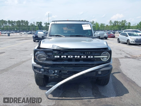 2023 Ford Bronco z VIN 1FMEE5DPXPLB06603, wystawiony jako IAAI lot #42183408 z przebiegiem 22 272 mil mil oraz . Historia ofert i sprzedaży dostępna na DreamBid. Obrazek 12.