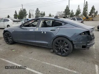 2014 Tesla Model S 60 with VIN 5YJSA1S14EFP56277, listed as a Copart auction lot 57162685 with Not provided miles and Salvage title. Bid and sale history available at DreamBid. Image 2.