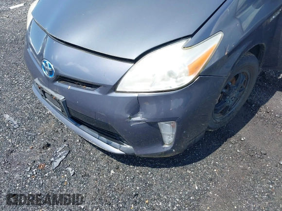 2013 Toyota Prius One with VIN JTDKN3DU8D1716993, listed as a IAAI auction lot 42202519 with 182,421 mi miles and . Bid and sale history available at DreamBid. Image 6.