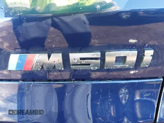 2020 BMW X5 M50i with VIN 5UXJU4C03LL227857, listed as a IAAI auction lot 41351112 with 65,325 mi miles and . Bid and sale history available at DreamBid. Image 19.