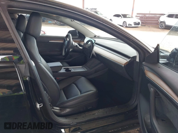 2022 Tesla Model 3 Long Range with VIN 5YJ3E1EB3NF257077, listed as a IAAI auction lot 42086629 with Not Provided miles and . Bid and sale history available at DreamBid. Image 5.