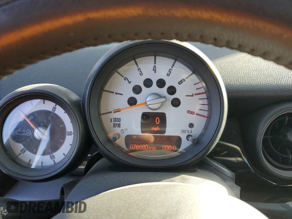 2014 MINI Convertible with VIN WMWZN3C5XET266498, listed as a Copart auction lot 77763074 with 76,680 mi miles and Non repairable. Bid and sale history available at DreamBid. Image 9.
