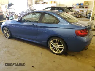 2015 BMW 2 Series 228i xDrive with VIN WBA1G9C55FVX96412, listed as a Copart auction lot 65273643 with 74,114 mi miles. Bid and sale history available at carsss.com. Image 2.