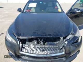 2014 Infiniti Q50 Premium z VIN JN1BV7AP2EM672661, wystawiony jako IAAI lot #42319325 z przebiegiem 85 803 mil mil oraz . Historia ofert i sprzedaży dostępna na DreamBid. Obrazek 10.