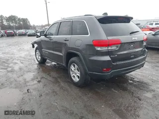 2016 Jeep Grand Cherokee Laredo with VIN 1C4RJFAG0GC325114, listed as a IAAI auction lot 40878955 with 277,225 mi miles. Bid and sale history available at carsss.com. Image 3.