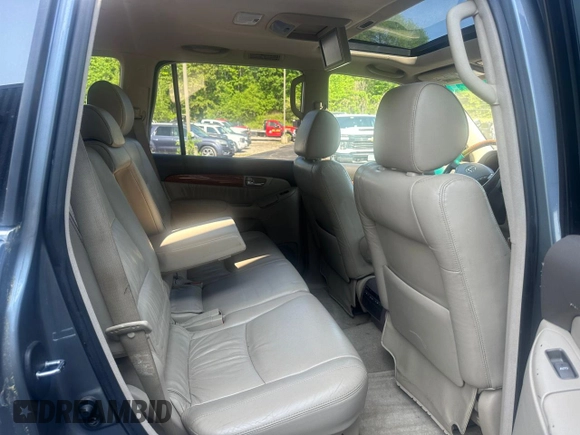 2005 Lexus GX 470 z VIN JTJBT20X050076167, wystawiony jako Copart lot #59916595 z przebiegiem 297 768 mil mil oraz Czysty tytuł • Clean title. Historia ofert i sprzedaży dostępna na DreamBid. Obrazek 6.