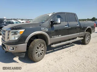 2016 Nissan Titan XD Platinum Reserve with VIN 1N6BA1F21GN502692, listed as a Copart auction lot 76125754 with 105,330 mi miles and Salvage Title. Bid and sale history available at carsss.com. Image 1.