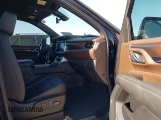 2021 GMC Yukon Denali with VIN 1GKS2DKL1MR135771, listed as a IAAI auction lot 41403680 with 61,772 mi miles. Bid and sale history available at carsss.com. Image 5.