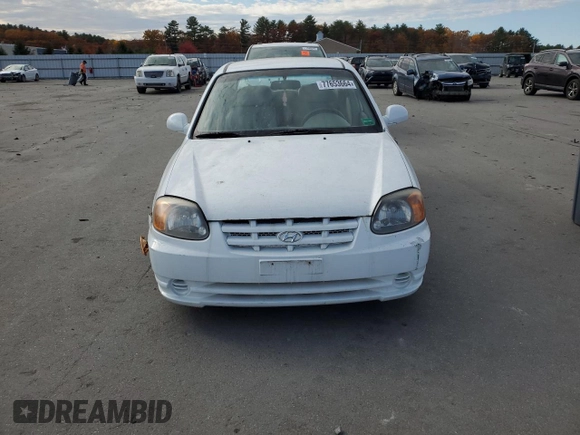 2005 Hyundai Accent GLS with VIN KMHCG45CX5U640554, listed as a Copart auction lot 77653664 with 179,642 mi miles and Clean Title. Bid and sale history available at carsss.com. Image 5.