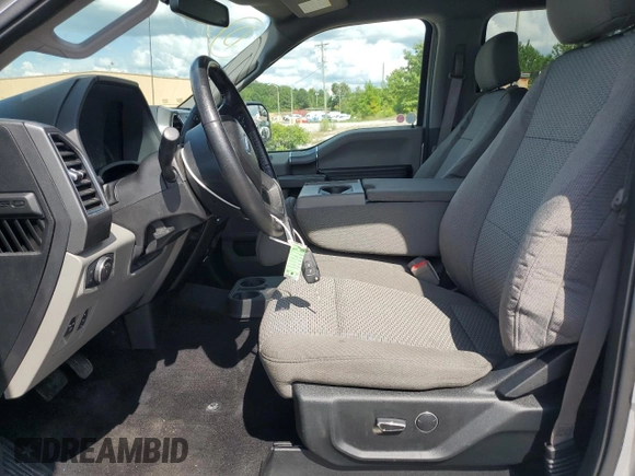 2018 Ford F-150 XL with VIN 1FTFW1EG3JFB90993, listed as a Copart auction lot 64446865 with 63,295 mi miles and Salvage title. Bid and sale history available at DreamBid. Image 7.