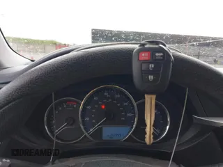 2016 Toyota Corolla L z VIN 5YFBURHE2GP397907, wystawiony jako IAAI lot #41795165 z przebiegiem 209 497 mil mil oraz . Historia ofert i sprzedaży dostępna na DreamBid. Obrazek 11.