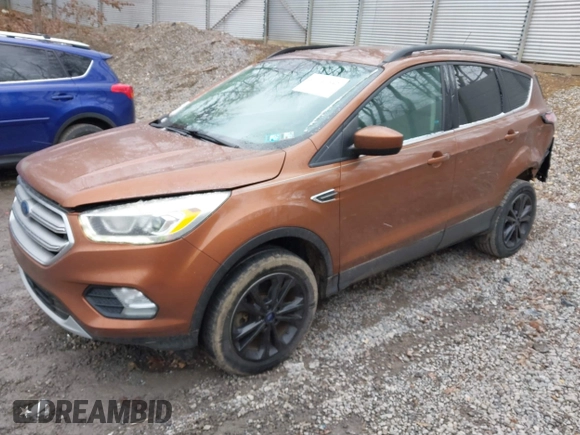 2017 Ford Escape SE with VIN 1FMCU9G96HUC12475, listed as a IAAI auction lot 41741342 with 102,823 mi miles. Bid and sale history available at carsss.com. Image 2.